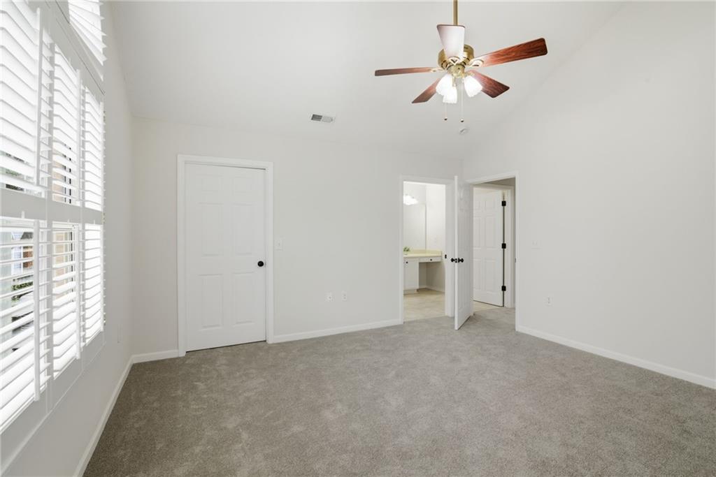 34102 Harvest Ridge Lane, Unit 34 Alpharetta, GA 30022 - Photo 24 of 31 a view of an empty room with a window