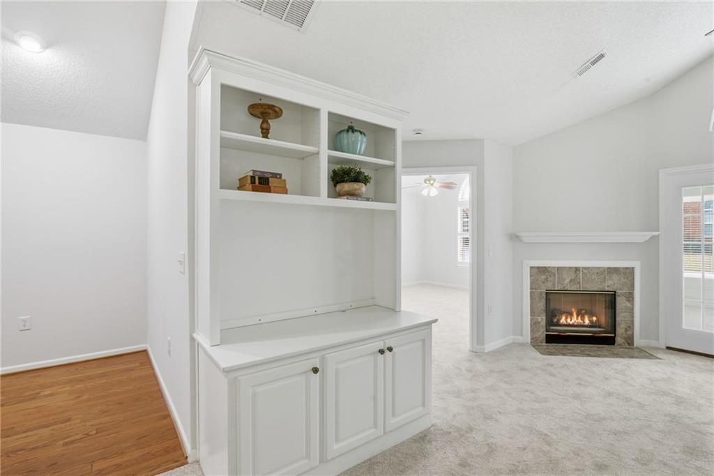 34102 Harvest Ridge Lane, Unit 34 Alpharetta, GA 30022 - Photo 9 of 31 a living room with fireplace