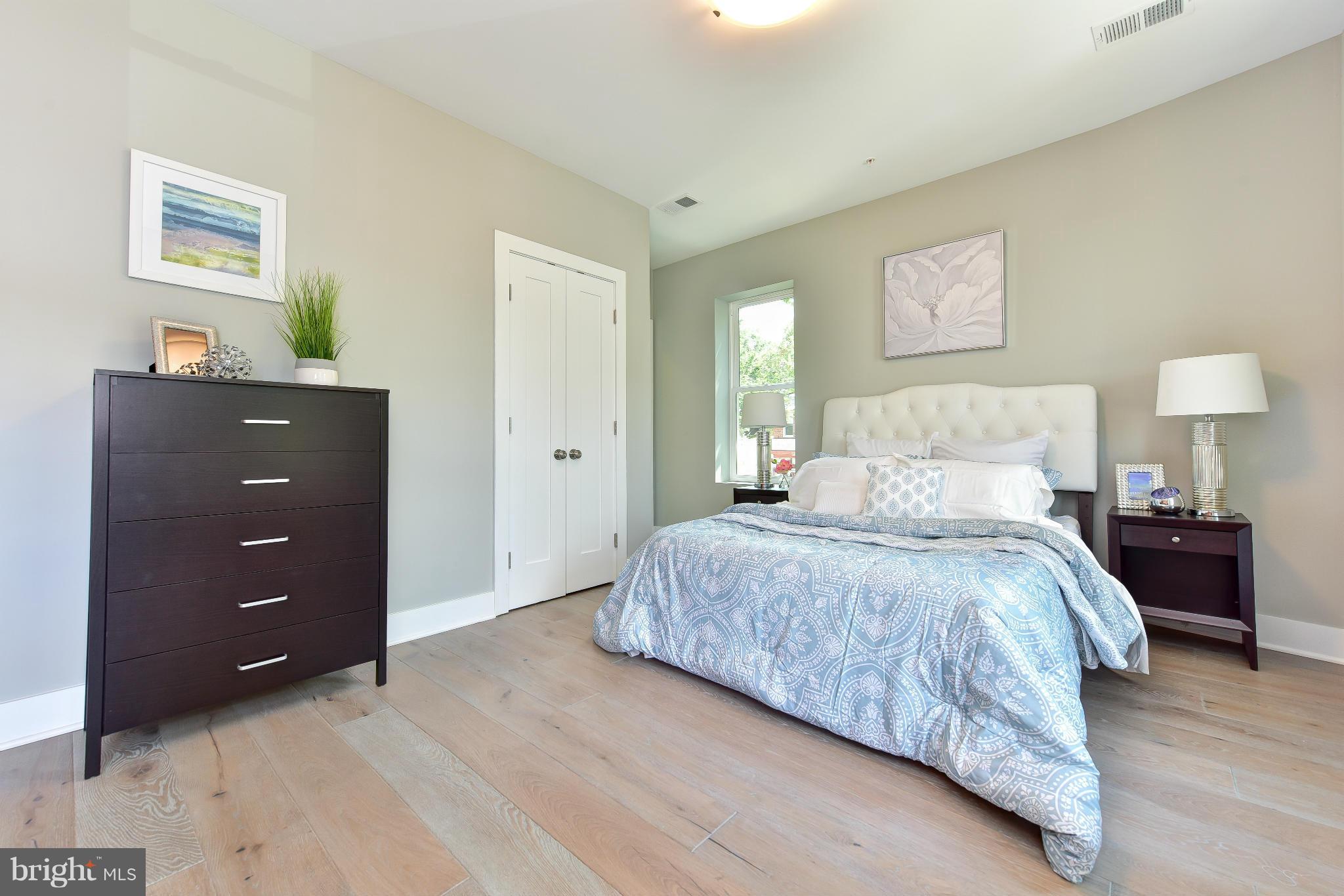 37 Todd Place Northeast, Unit 2 Washington, DC 20002 - Photo 17 of 21 a bedroom with a bed and a closet