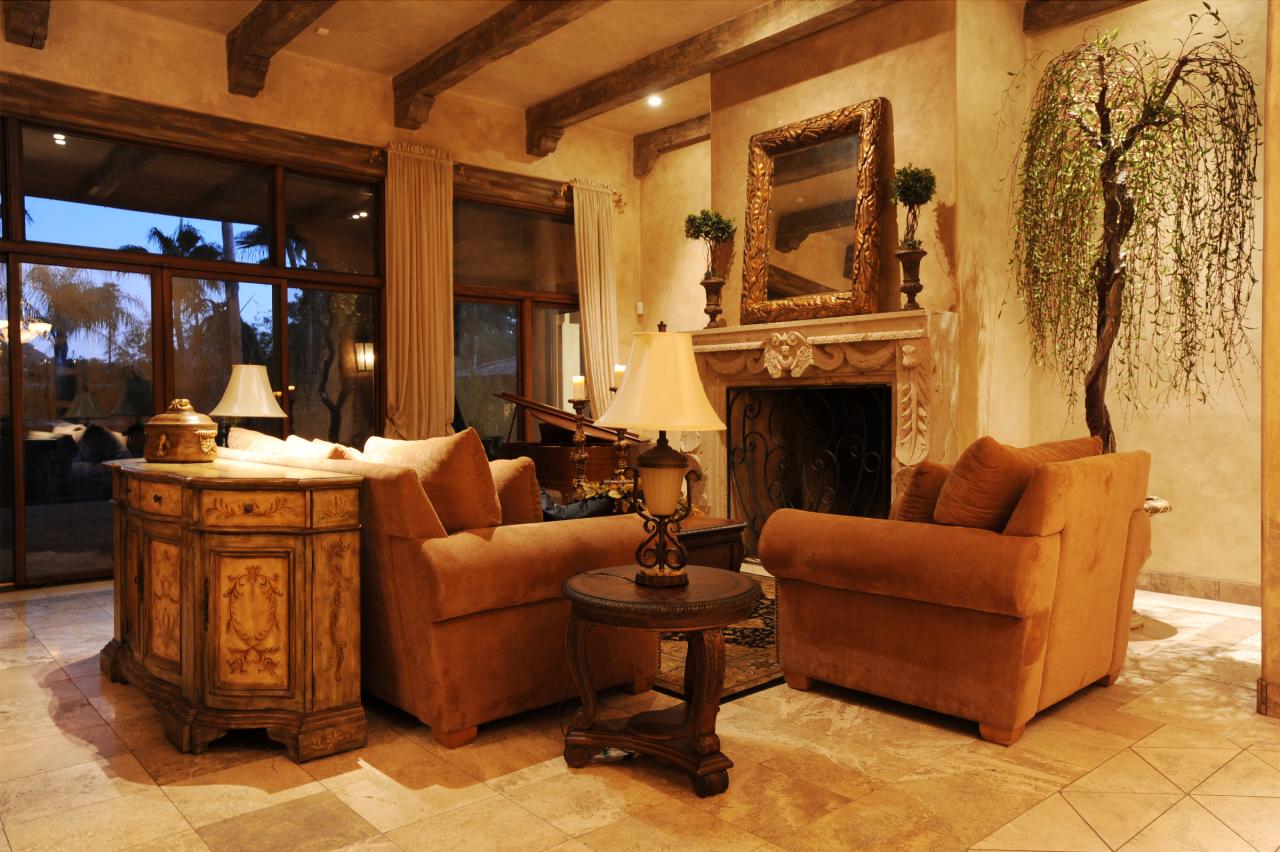4811 East Pebble Ridge Road Paradise Valley, AZ 85253 - Photo 3 of 20 a living room with furniture a fireplace and a floor to ceiling window