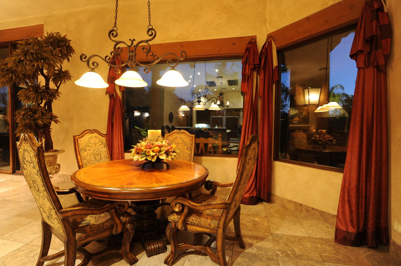4811 East Pebble Ridge Road Paradise Valley, AZ 85253 - Photo 7 of 20 a view of a patio with dining table and chairs
