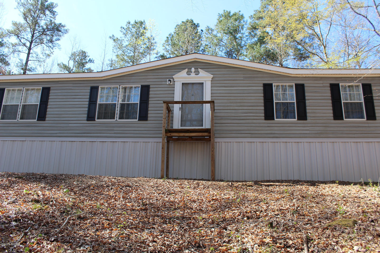 10094 Zebulon Road Forsyth, GA 31029 - Photo 1 of 20 a backyard of a house