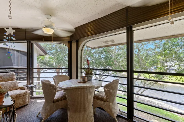 a view of a city from a dining room with furniture window and outside view