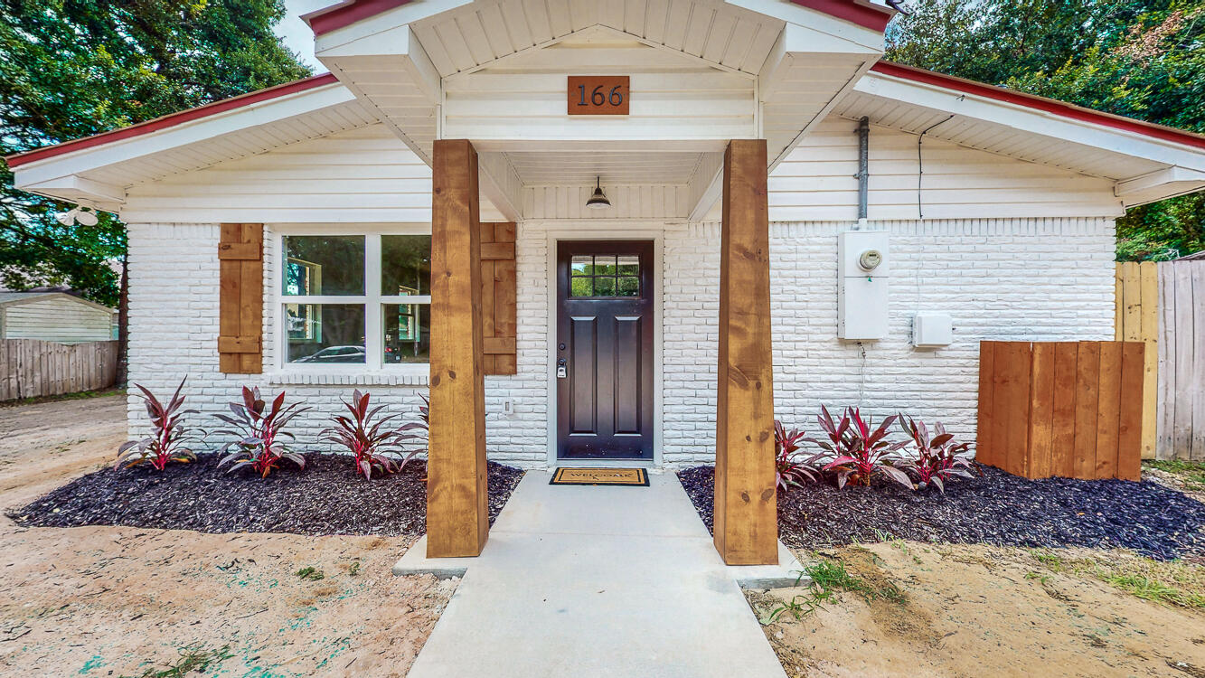 166 Patch Avenue Crestview, FL 32539 - Photo 14 of 48 a front view of a house with a patio