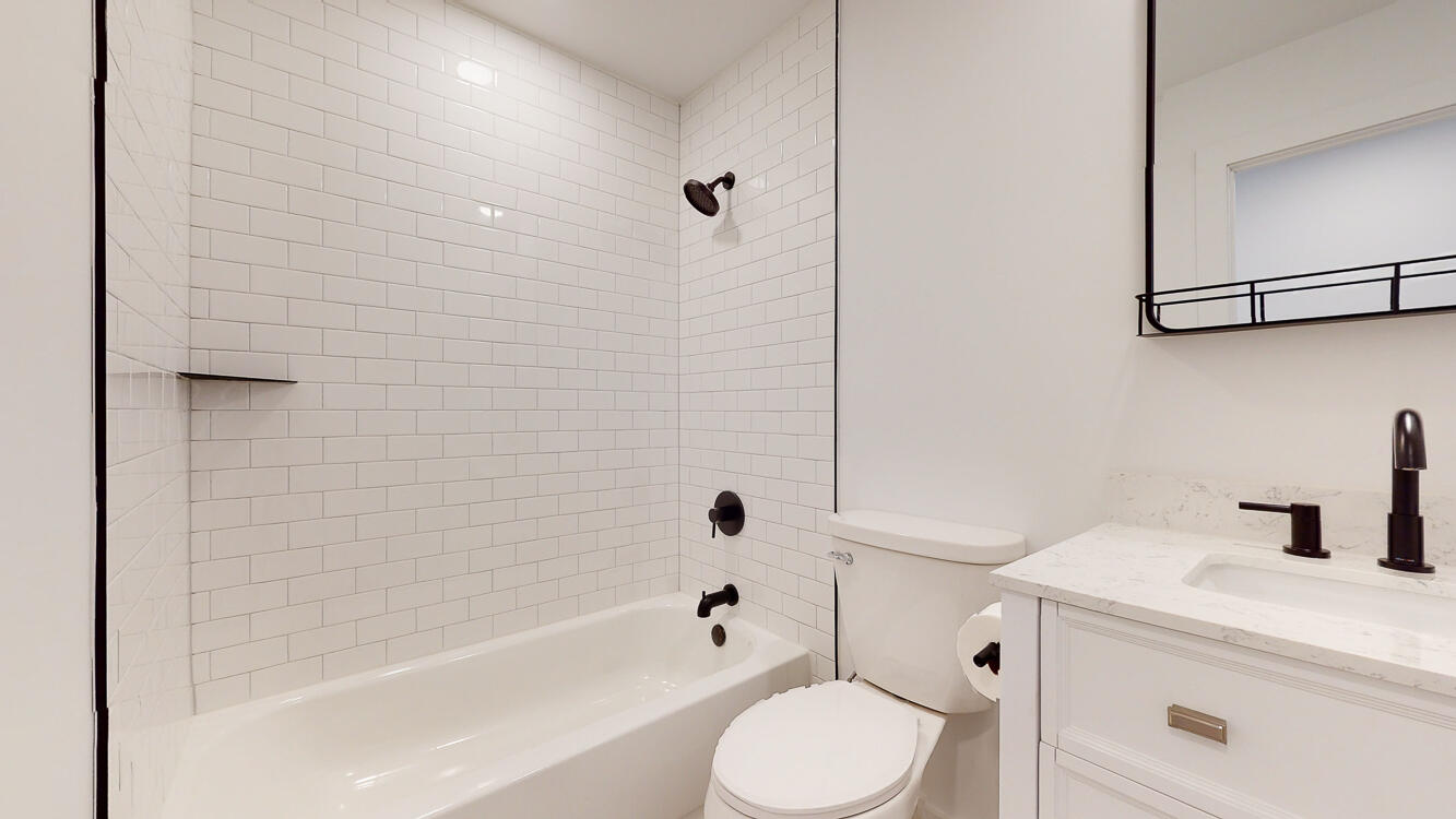 166 Patch Avenue Crestview, FL 32539 - Photo 17 of 48 a bathroom with a sink toilet and shower