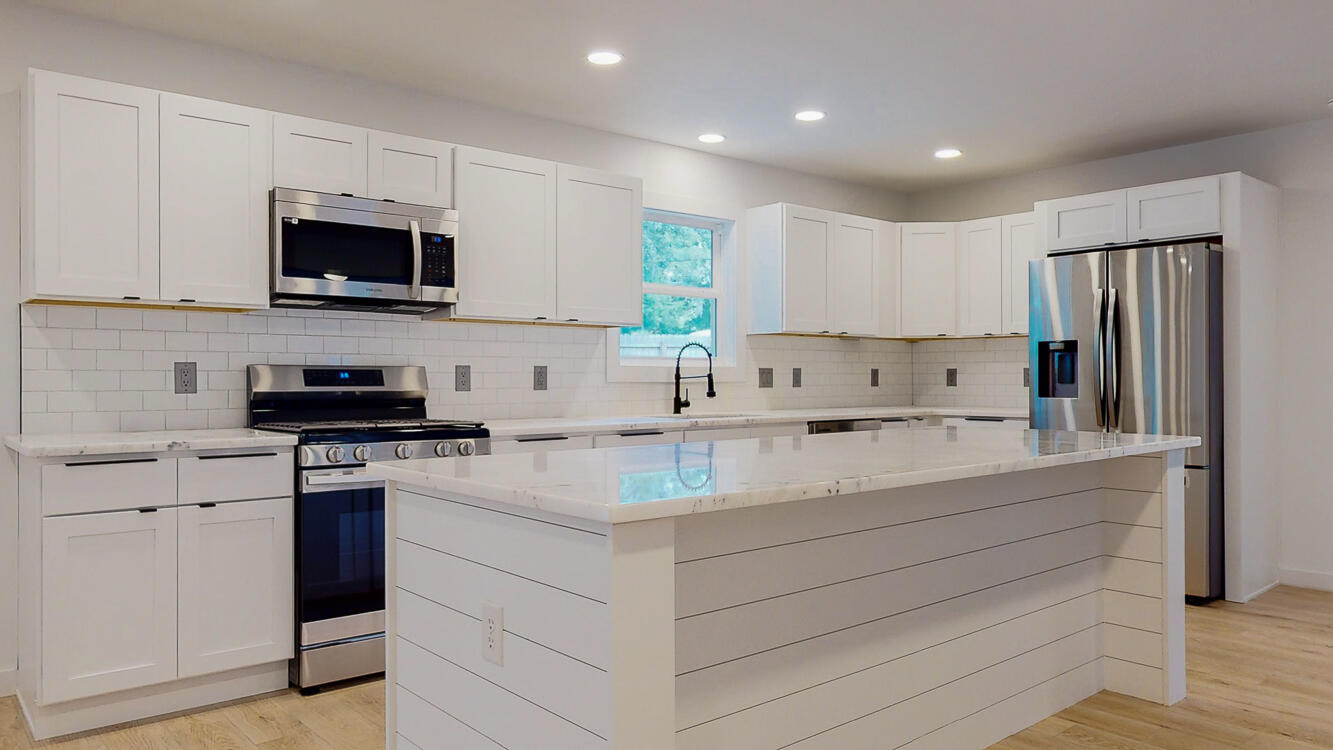166 Patch Avenue Crestview, FL 32539 - Photo 22 of 48 a kitchen with a sink stove and microwave