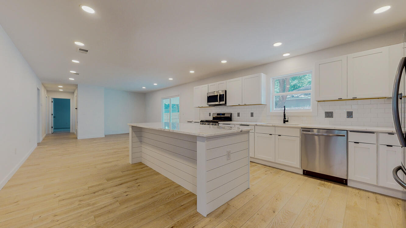 166 Patch Avenue Crestview, FL 32539 - Photo 25 of 48 a large white kitchen with cabinets