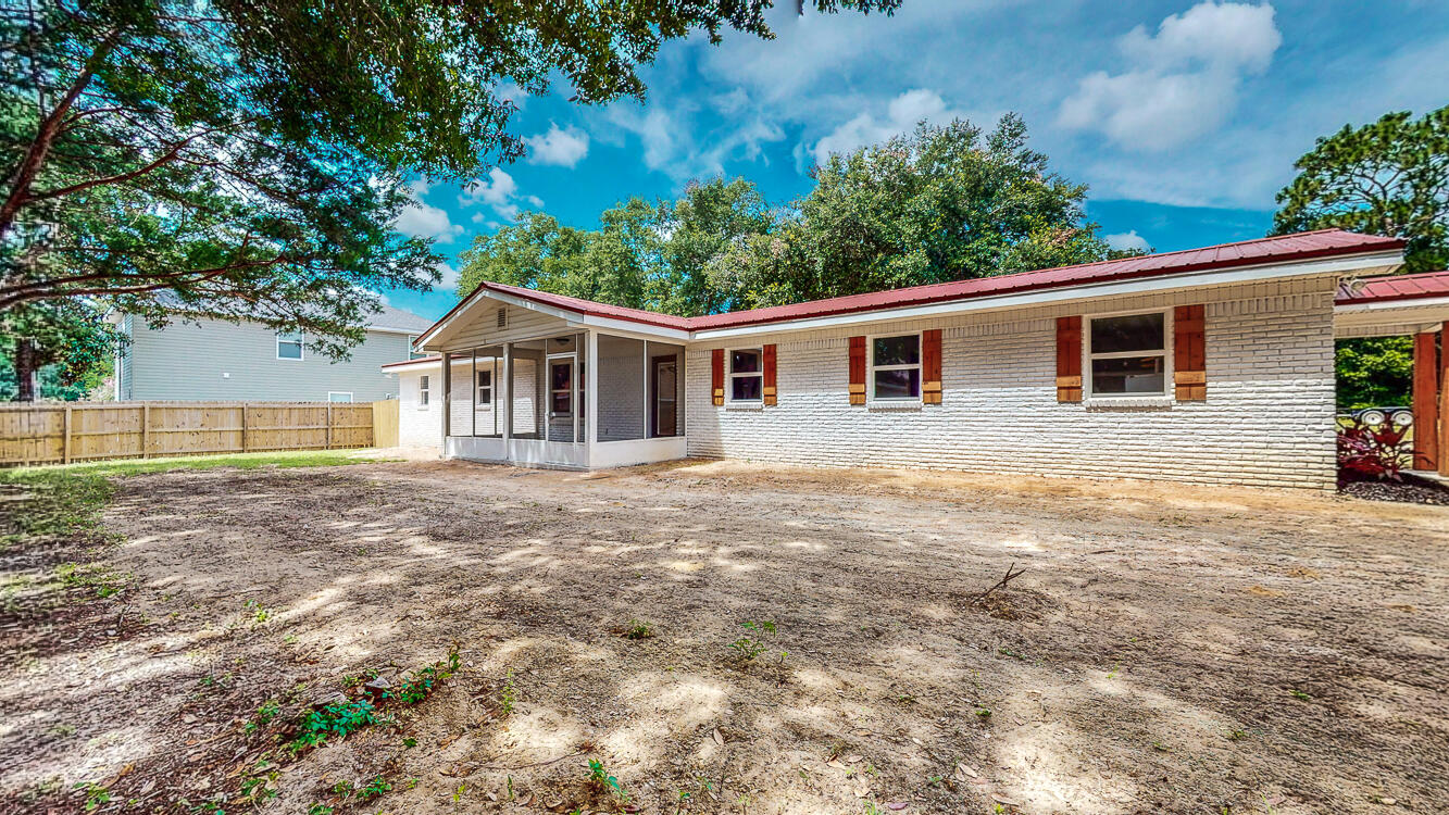 166 Patch Avenue Crestview, FL 32539 - Photo 3 of 48 a view of outdoor space yard and porch