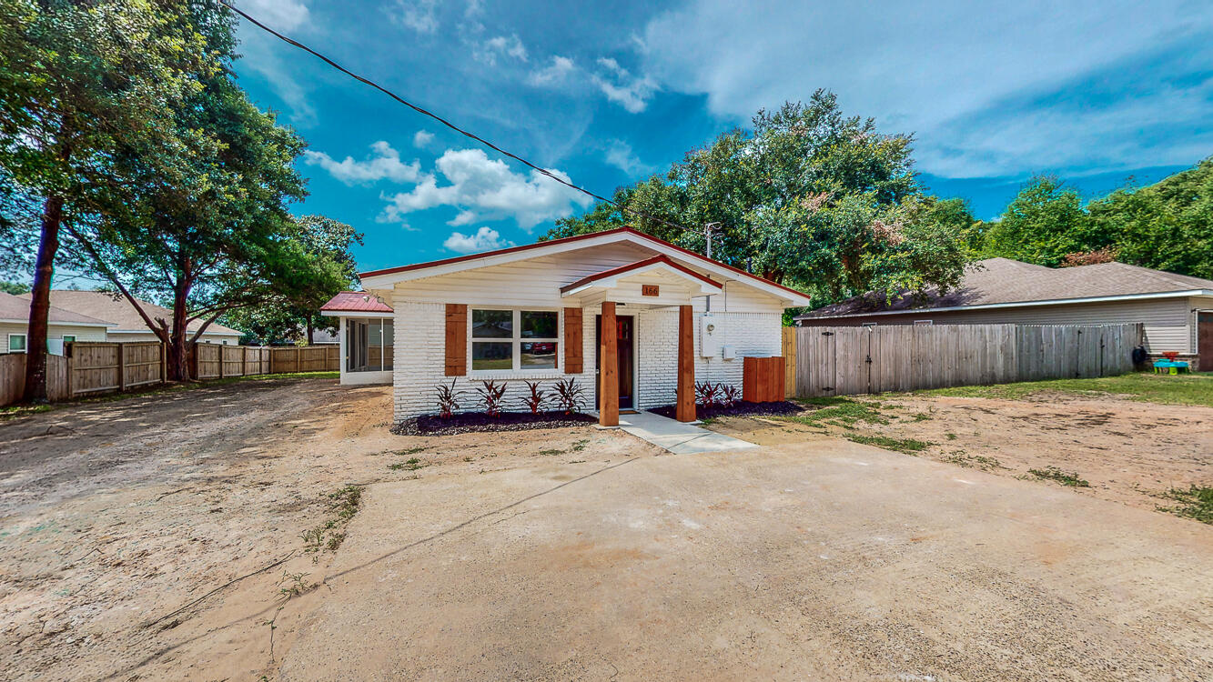 166 Patch Avenue Crestview, FL 32539 - Photo 33 of 48 a view of a house with a yard
