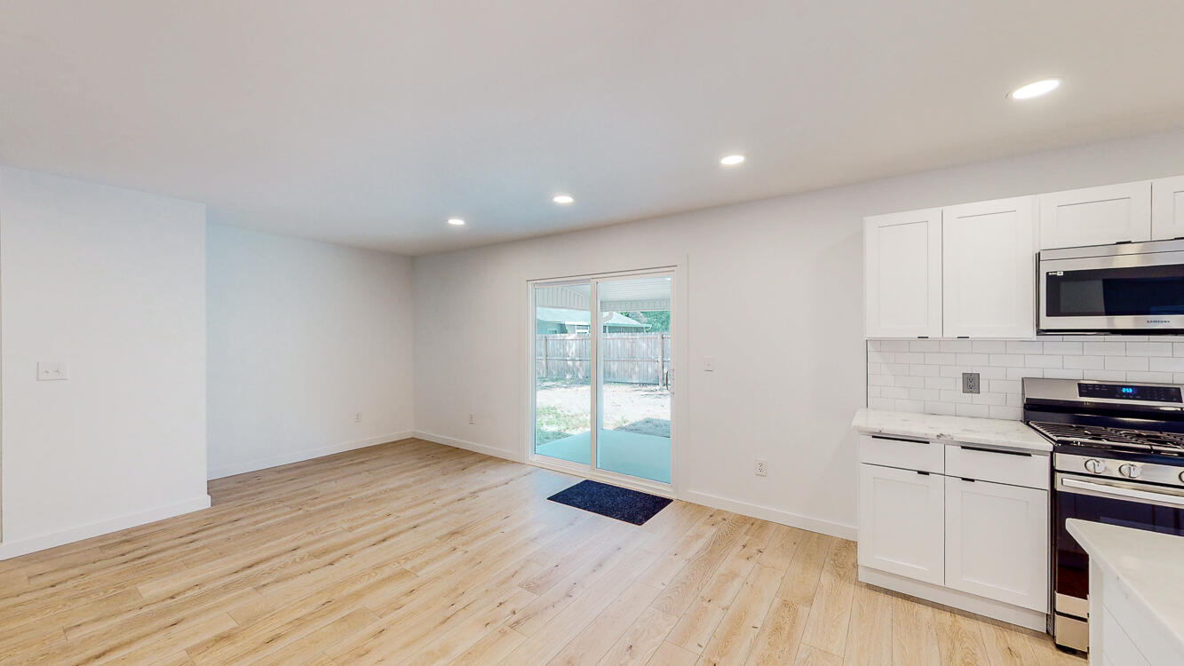 166 Patch Avenue Crestview, FL 32539 - Photo 39 of 48 a kitchen with stainless steel appliances a refrigerator and a stove top oven