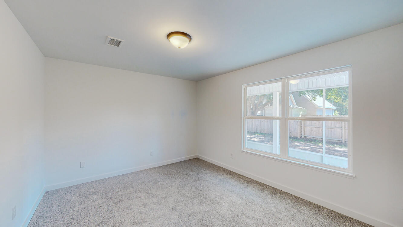 166 Patch Avenue Crestview, FL 32539 - Photo 41 of 48 an empty room with windows
