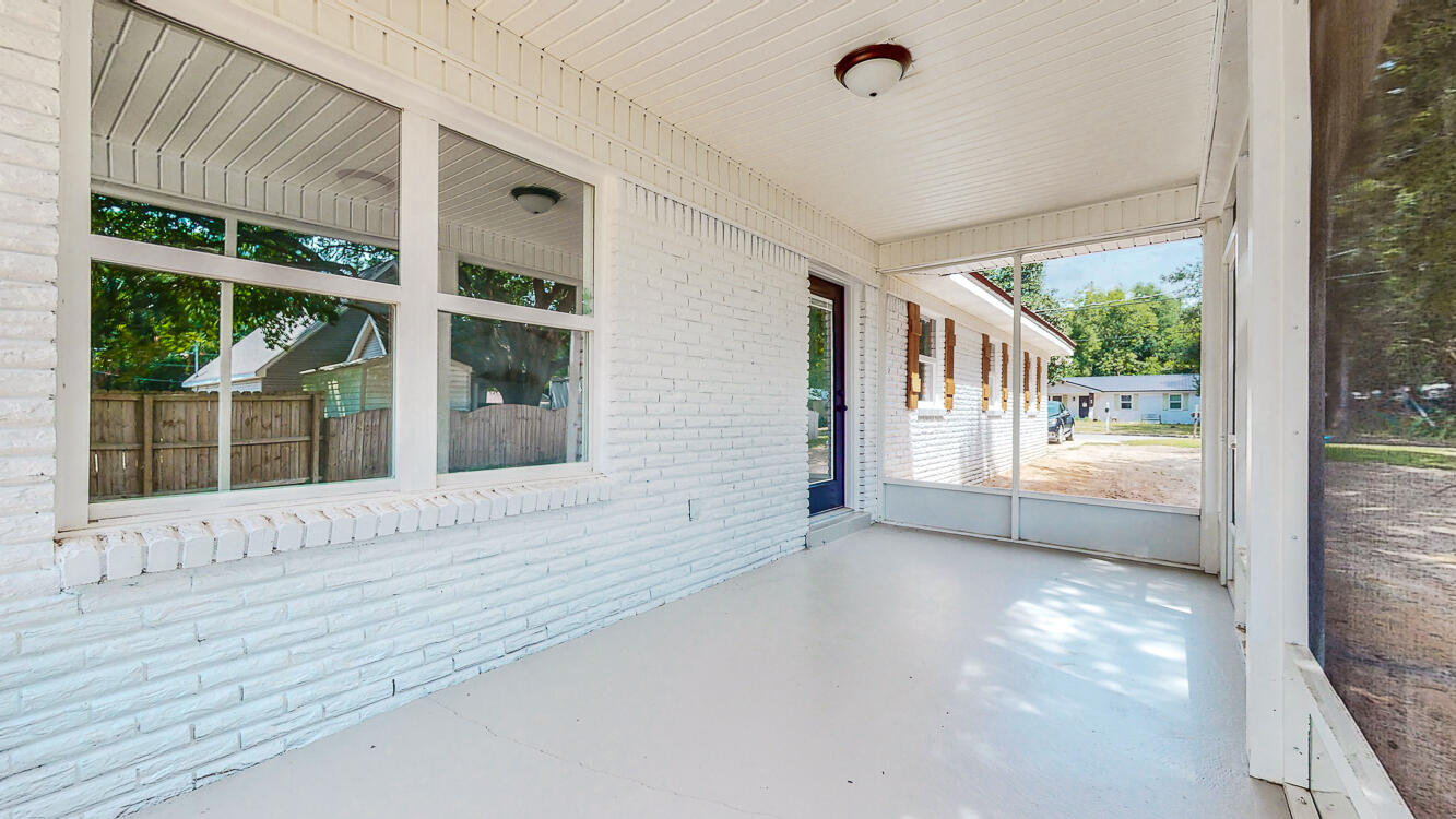 166 Patch Avenue Crestview, FL 32539 - Photo 5 of 48 a view of an empty room with a window