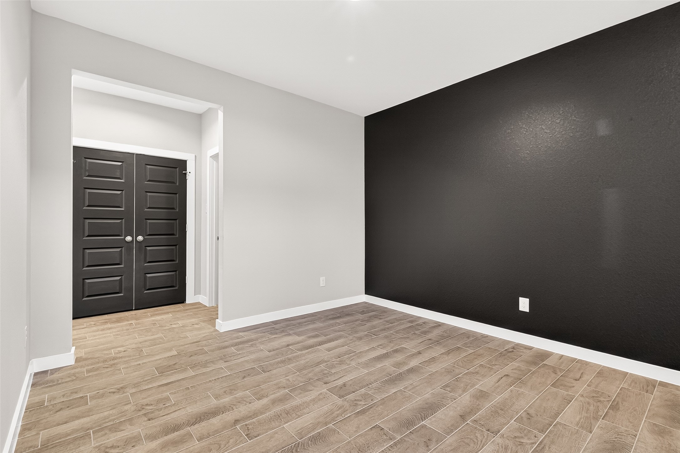 2142 Reed Cave Lane Spring, TX 77386 - Photo 10 of 50 a view of an empty room with wooden floor