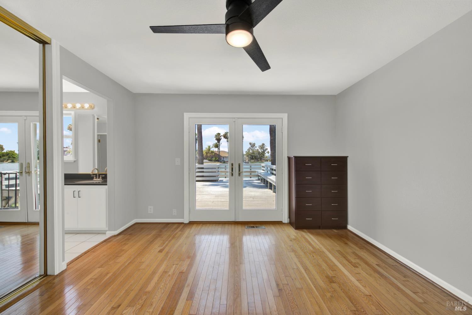 1270 Willow Lake Road Discovery Bay, CA 94505 - Photo 23 of 29 a view of empty room with wooden floor