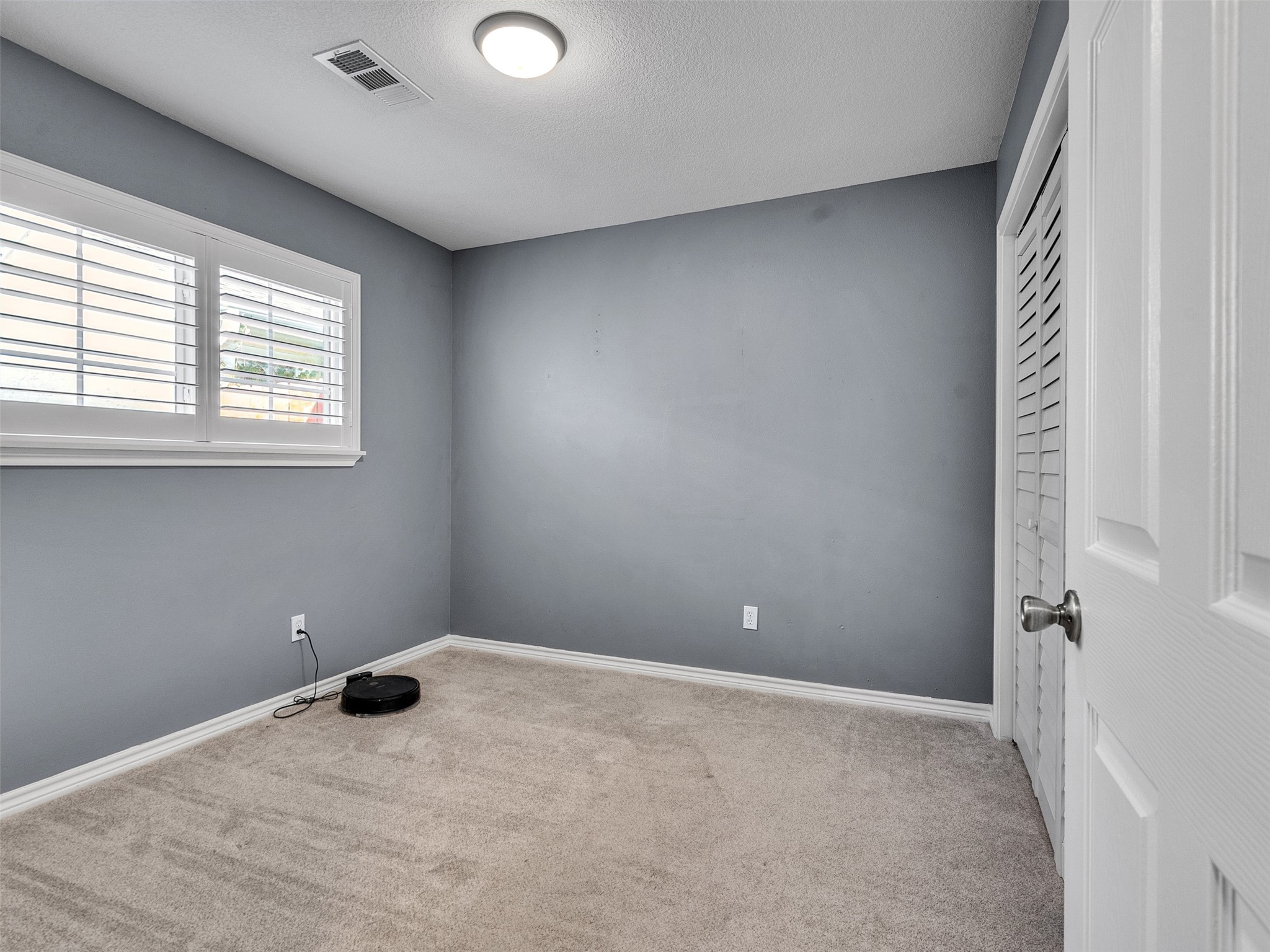 10109 Schaper Road Galveston, TX 77554 - Photo 15 of 33 a view of an empty room with a window