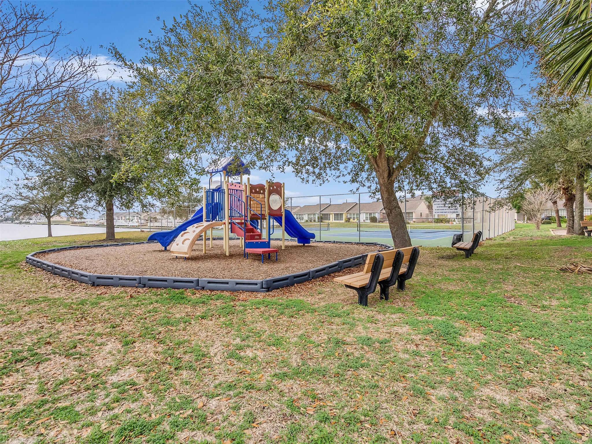 10109 Schaper Road Galveston, TX 77554 - Photo 23 of 33 Enjoy community perks like a sparkling swimming pool and tennis courts — perfect for staying active or socializing. Close to Evia Lifestyle Center’s shopping, dining, and entertainment options, you’re never far from great food and fun! Meaningful lifestyle comforts just steps from your door.