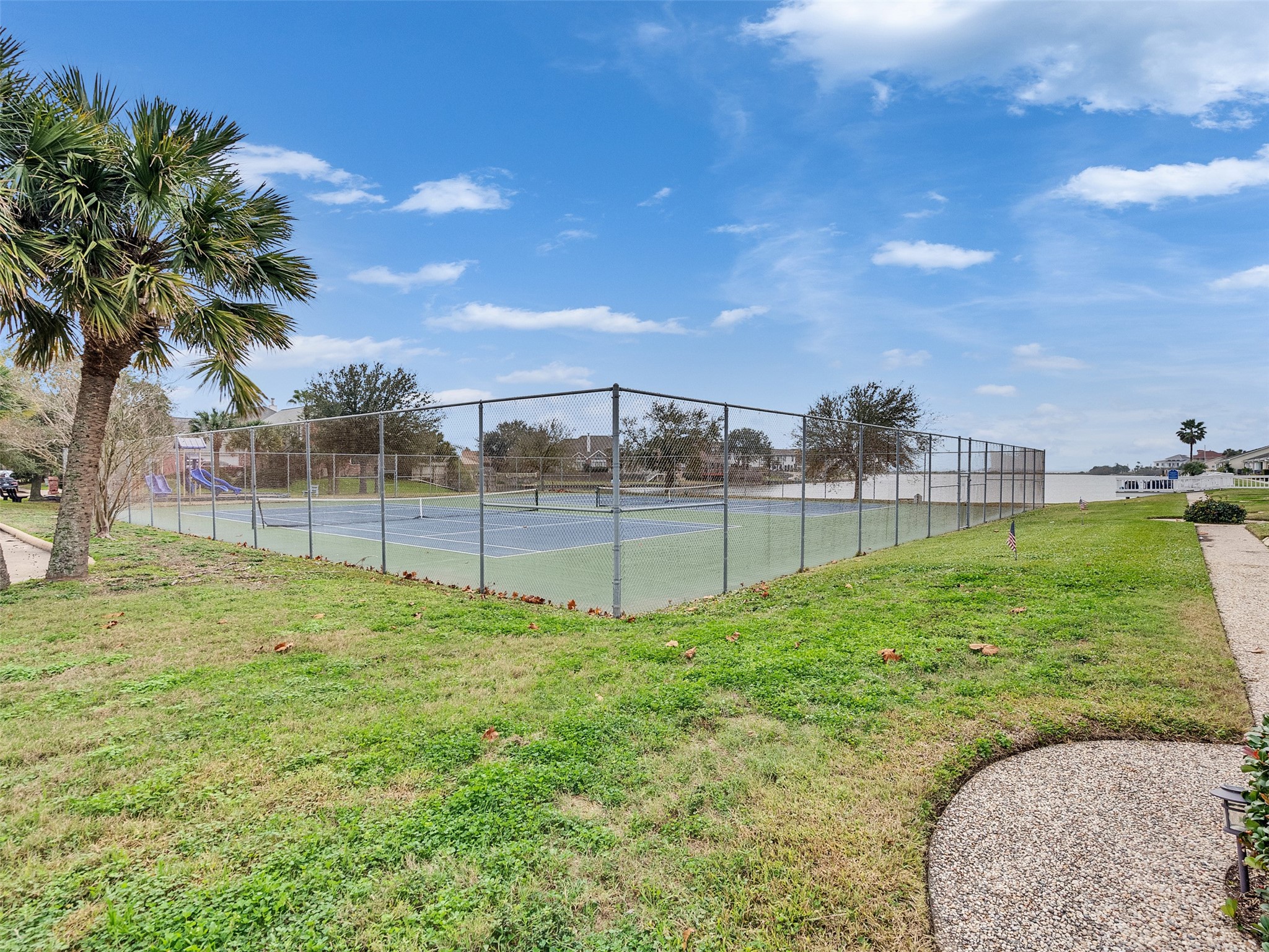 10109 Schaper Road Galveston, TX 77554 - Photo 26 of 33 Step outside and enjoy EASY ACCESS to the COMMUNITY BASKETBALL AND TENNIS COURTS for fun and fitness.