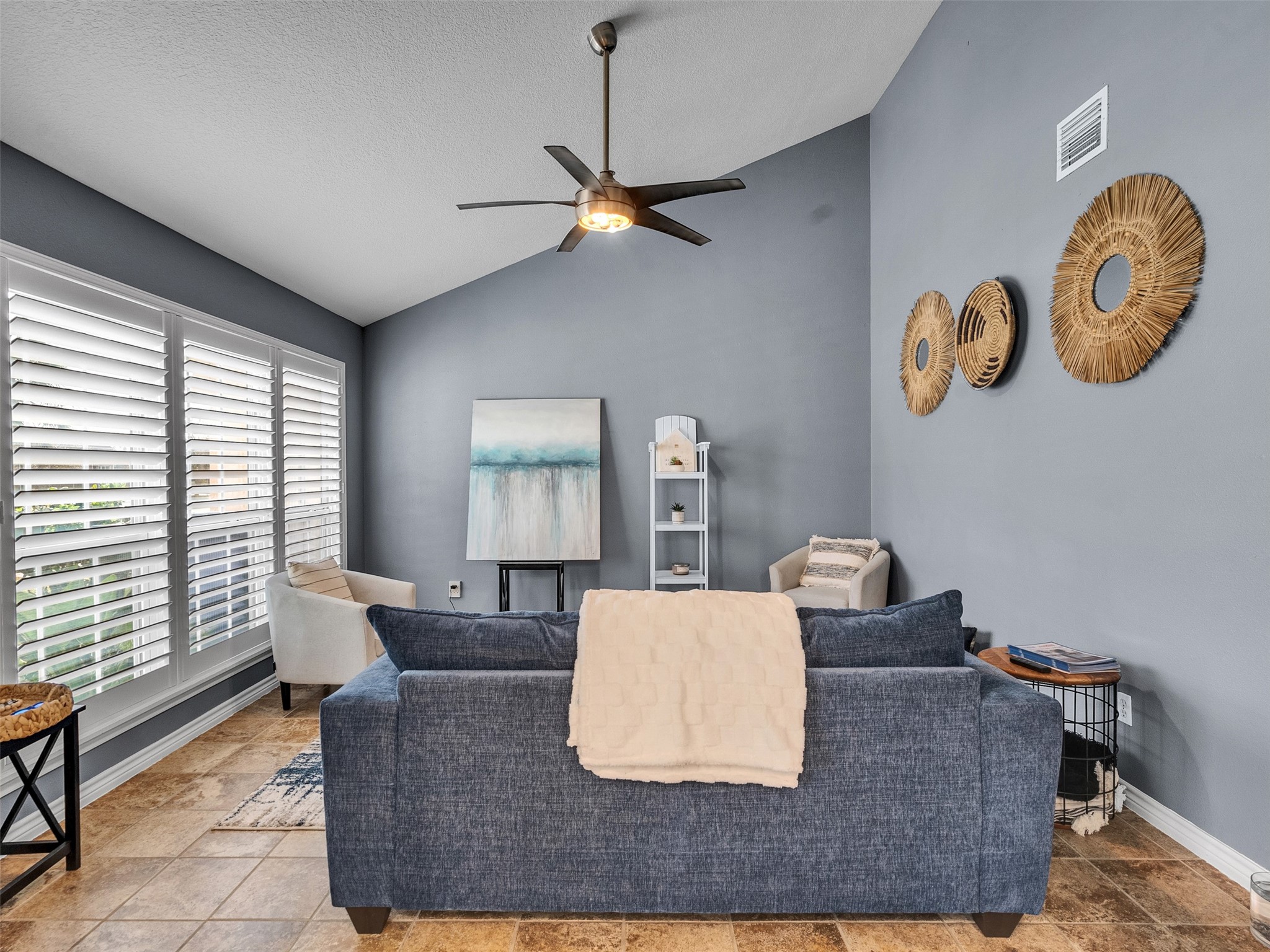 10109 Schaper Road Galveston, TX 77554 - Photo 3 of 33 a living room with furniture and a window
