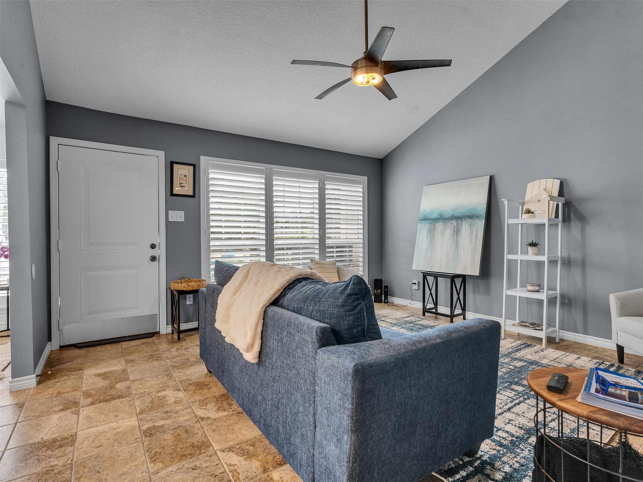 10109 Schaper Road Galveston, TX 77554 - Photo 10 of 33 a living room with furniture and a window