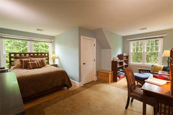 52 MacMillan Drive Concord, MA 01742 - Photo 17 of 23 a bedroom with furniture and a window