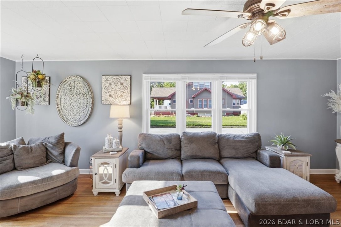 316 North Maple Street Eldon, MO 65026 - Photo 8 of 66 Bright spacious living room with original hardwood
