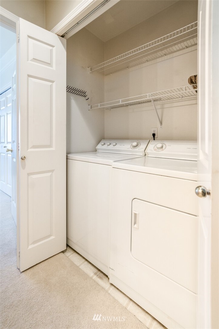 23908 Bothell Everett Highway, Unit A103 Bothell, WA 98021 - Photo 12 of 20 a utility room with dryer and washer