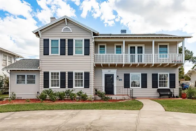 front view of a house with a yard