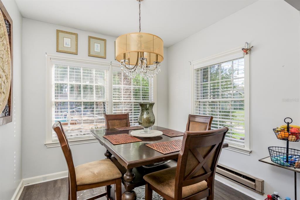 1111 West Line Street Leesburg, FL 34748 - Photo 17 of 77 a view of a dining room with furniture window and outside view