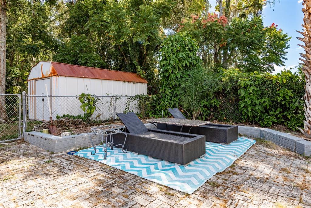 1111 West Line Street Leesburg, FL 34748 - Photo 42 of 77 a view of a backyard with sitting area