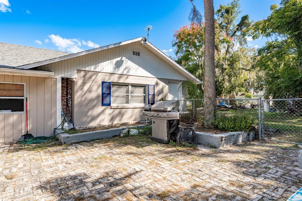 1111 West Line Street Leesburg, FL 34748 - Photo 50 of 77 a view of a house with a yard