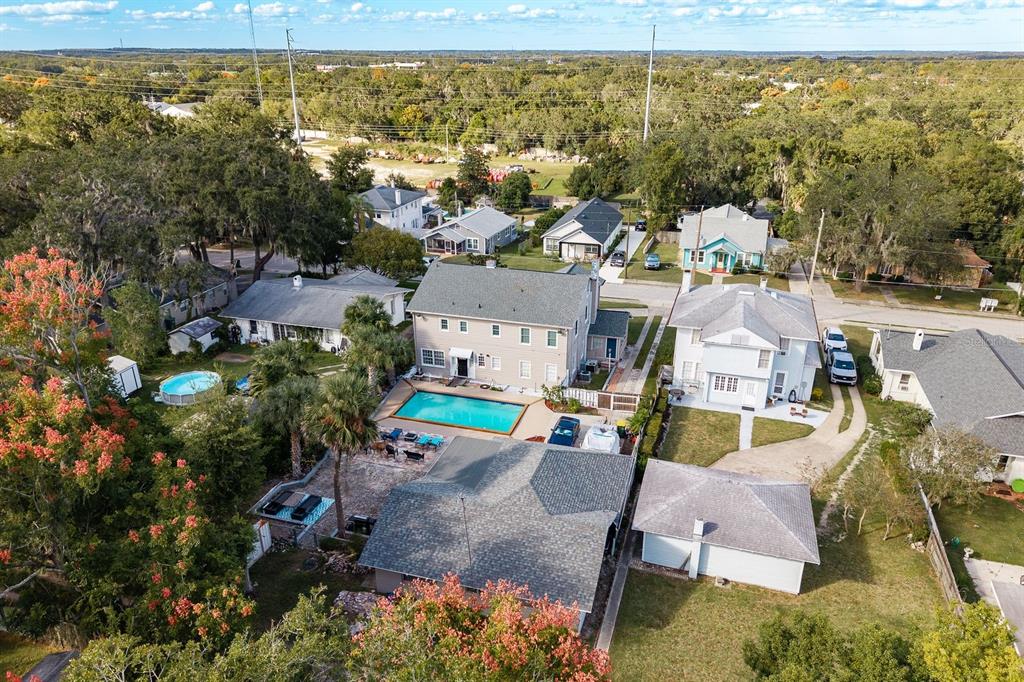 1111 West Line Street Leesburg, FL 34748 - Photo 67 of 77 an aerial view of residential houses with outdoor space