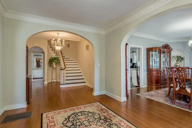a kitchen with stainless steel appliances granite countertop a stove sink microwave and cabinets