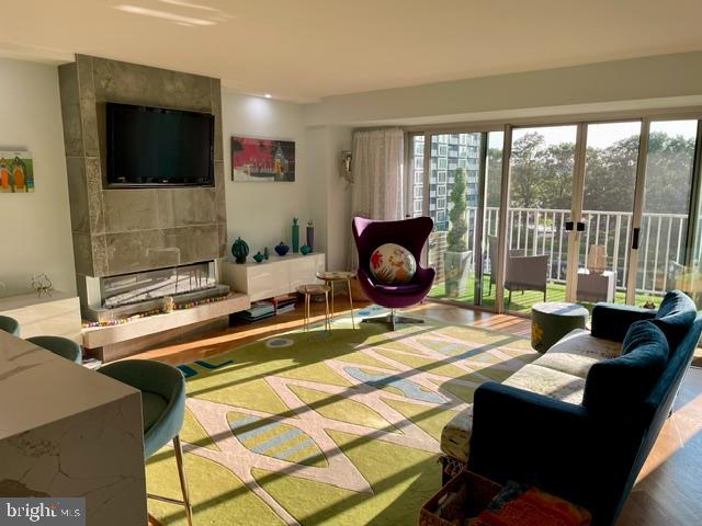 a room with furniture and a flat screen tv