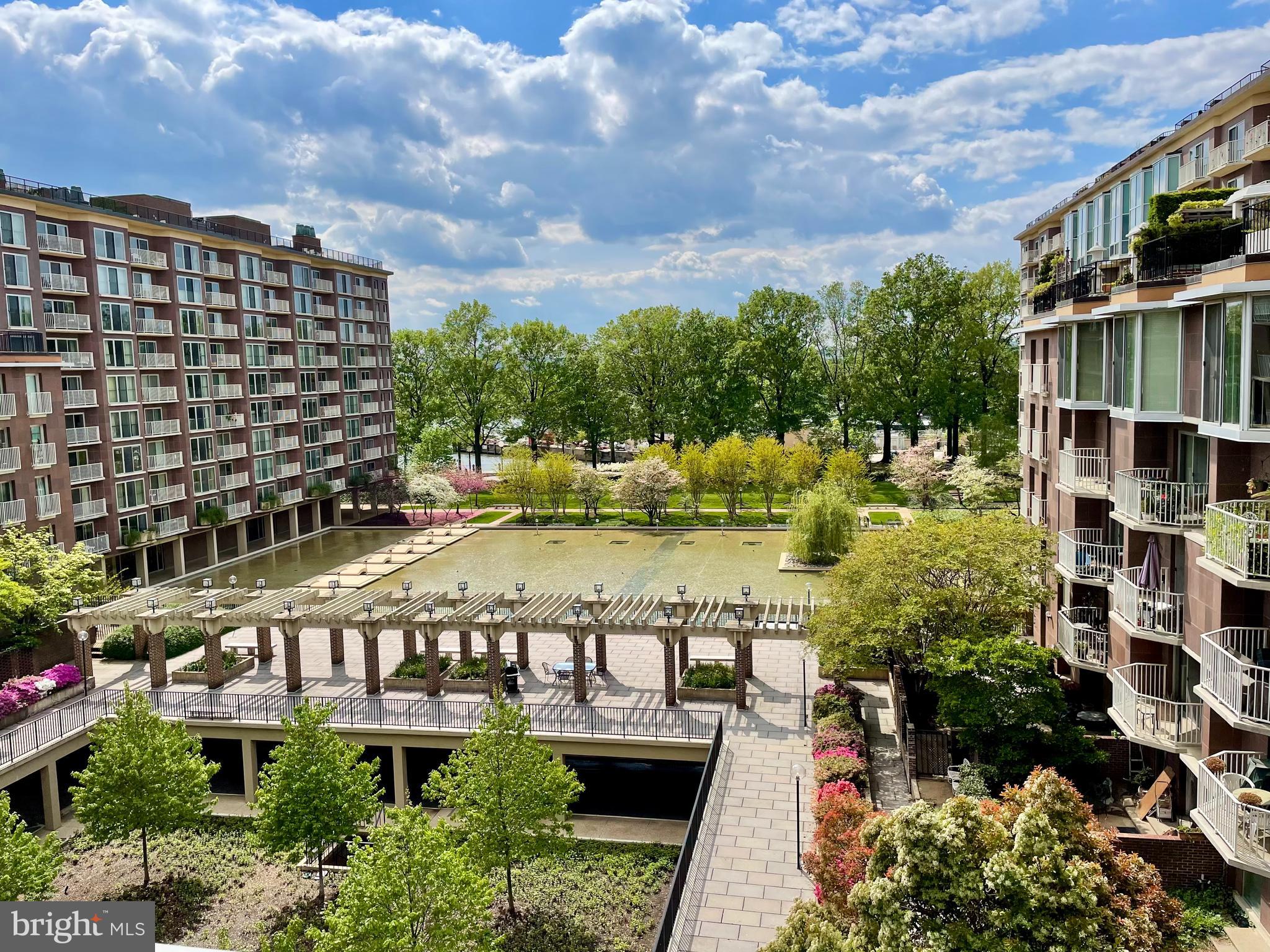 510 N Street Southwest, Unit N526 Washington, DC 20024 - Photo 8 of 9 a view of swimming pool with outdoor seating and plants