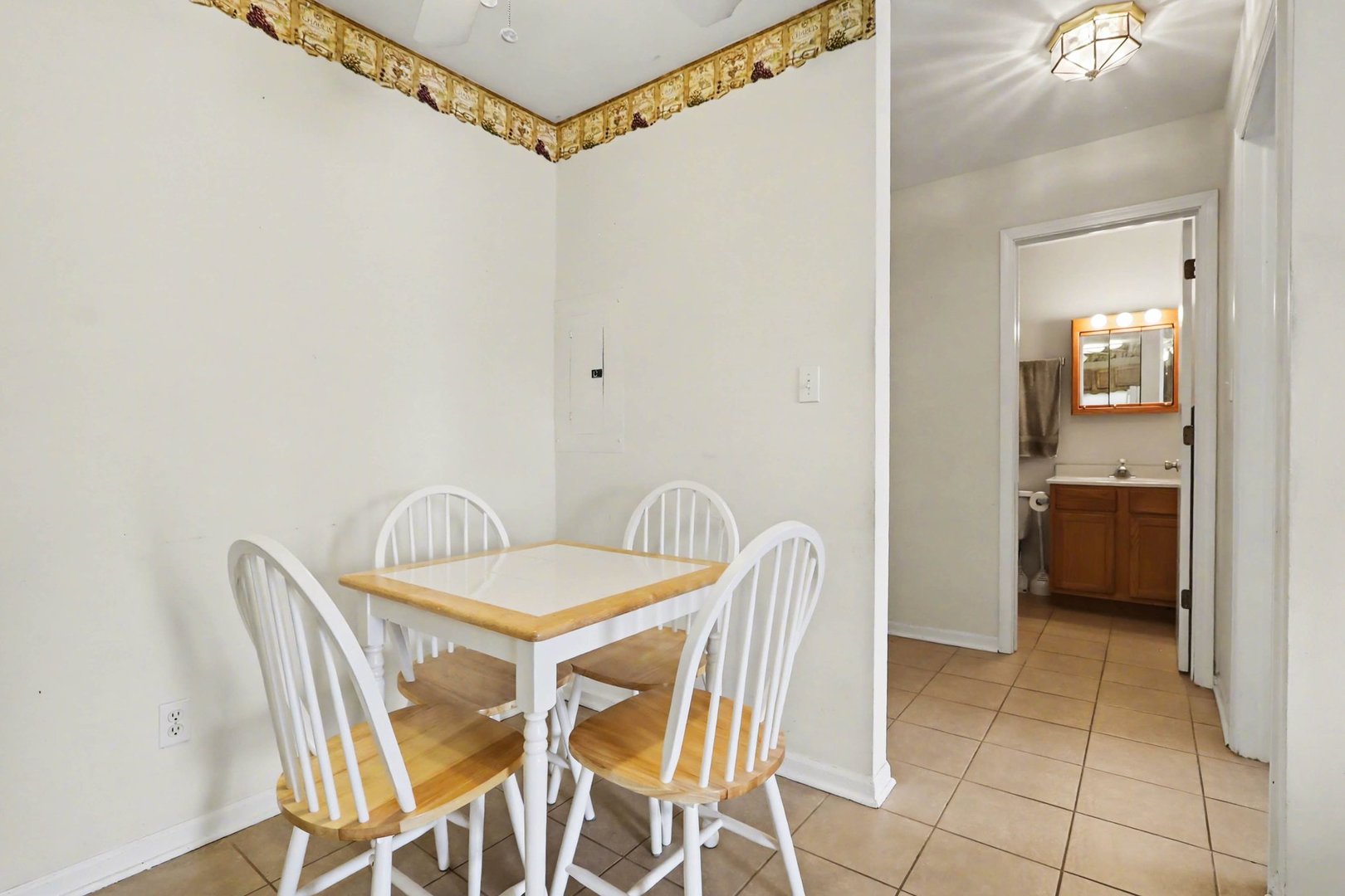1900 Light Road, Unit 210 Oswego, IL 60543 - Photo 4 of 15 a view of a dining room with furniture