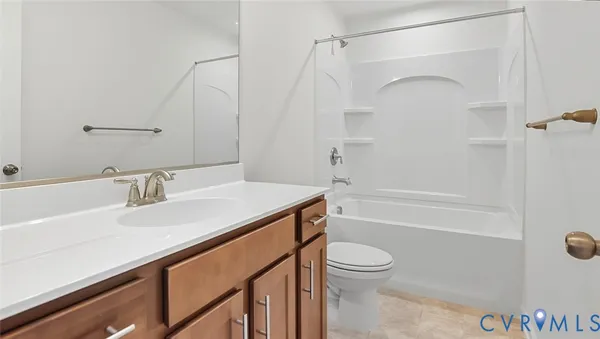 a bathroom with a sink a toilet and a bathtub