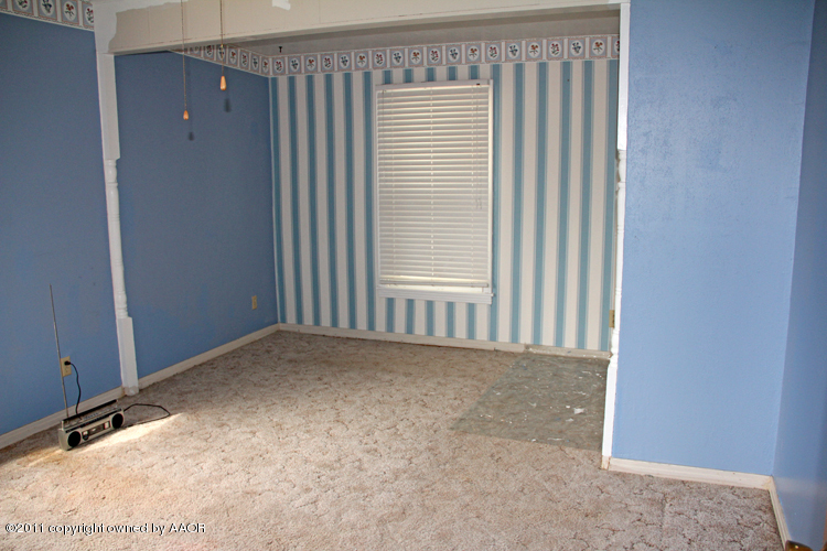4303 South Lipscomb Street Amarillo, TX 79110 - Photo 12 of 35 a view of a livingroom with a staircase