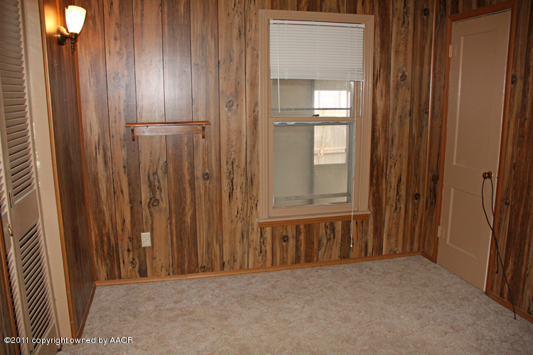 4303 South Lipscomb Street Amarillo, TX 79110 - Photo 25 of 35 a view of a livingroom with wooden floor
