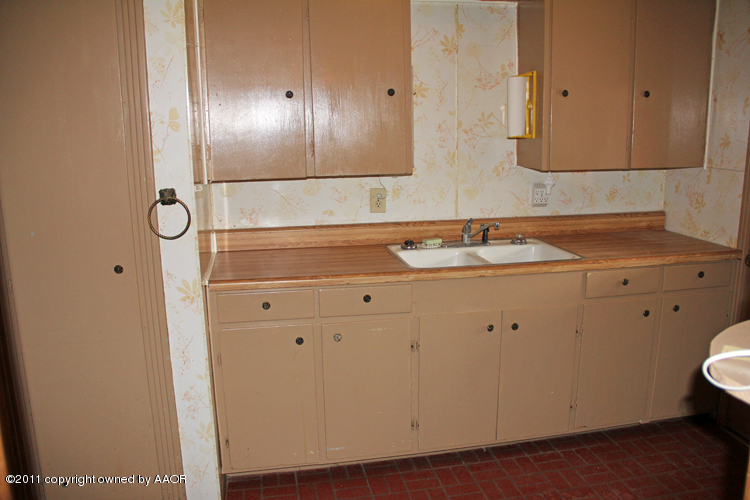 4303 South Lipscomb Street Amarillo, TX 79110 - Photo 27 of 35 a bathroom with a sink and a mirror