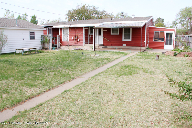 4303 South Lipscomb Street Amarillo, TX 79110 - Photo 31 of 35 a front view of a house with a yard