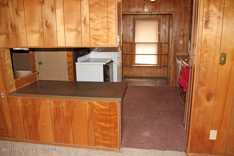 4303 South Lipscomb Street Amarillo, TX 79110 - Photo 8 of 35 a view of an empty room with a window