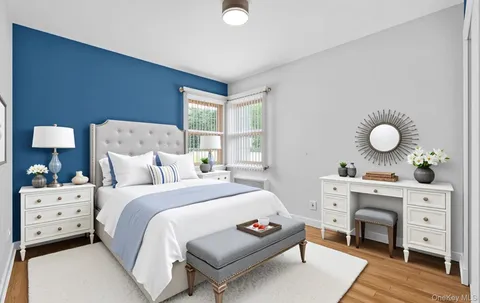 an empty room with a workspace and windows