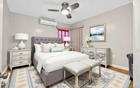 a bathroom with a sink a toilet and shower curtain