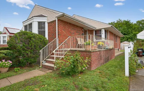 a view of a livingroom with a furniture and a window