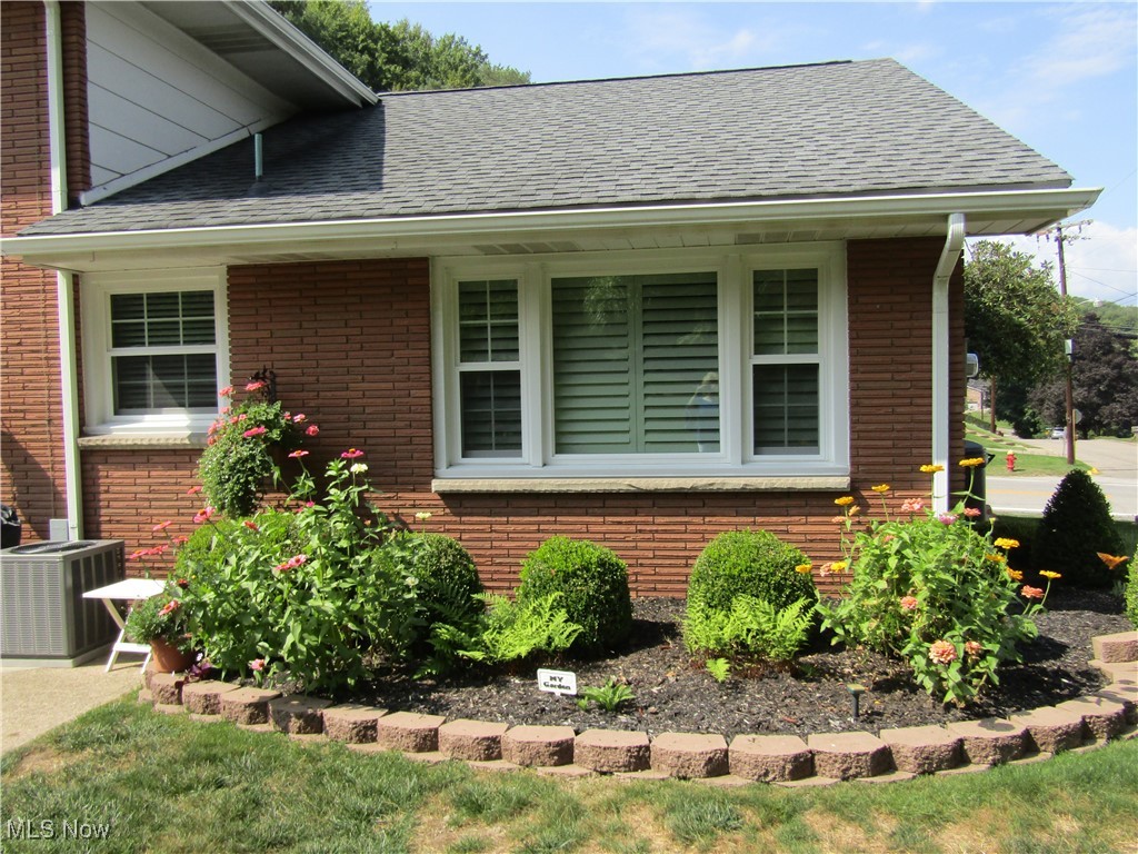 2970 Culler Road Weirton, WV 26062 - Photo 28 of 34 View of property exterior featuring cooling unit and covered porch