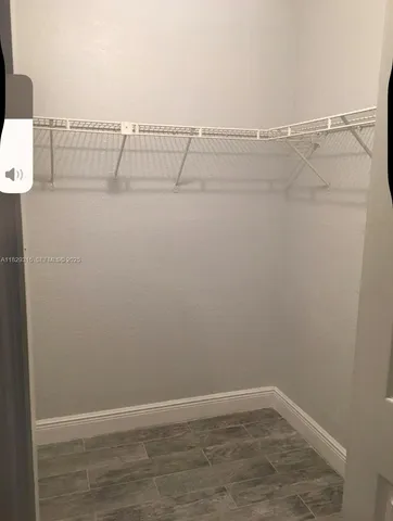 a utility room with cabinets