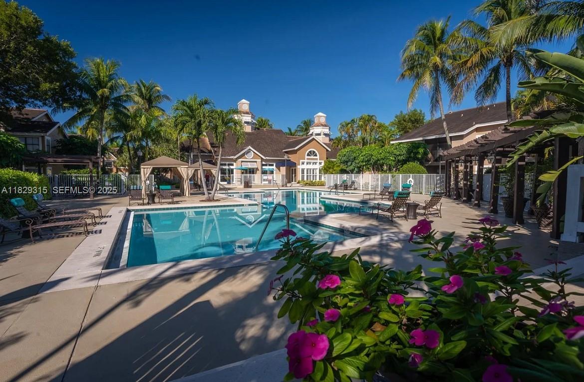 10670 Southwest 156th Place, Unit 309 Miami, FL 33196 - Photo 29 of 31 a view of yard with green space