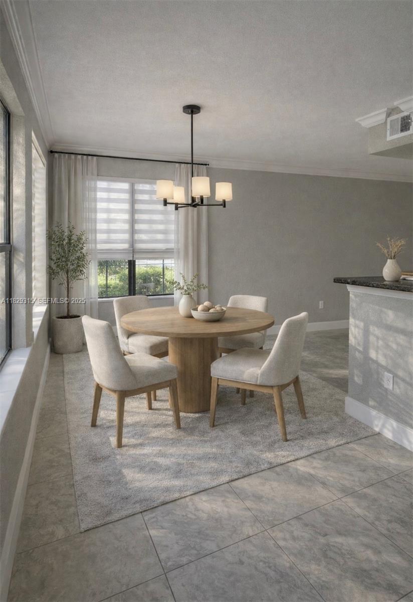 10670 Southwest 156th Place, Unit 309 Miami, FL 33196 - Photo 7 of 31 a dining room with furniture and window