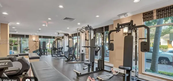 a view of a lobby with gym equipment