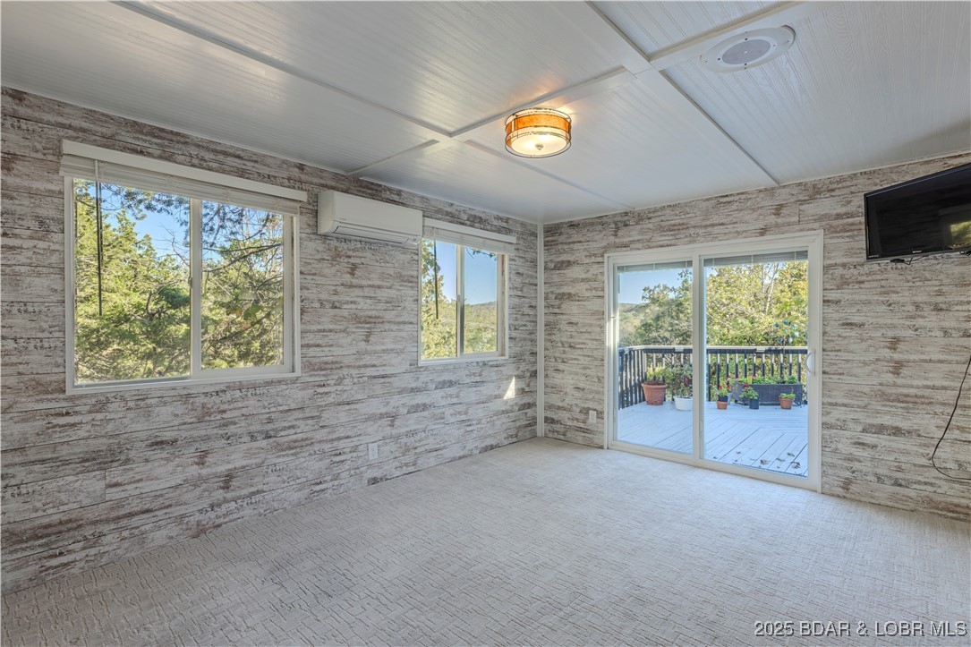 270 Country Club Shores Road Camdenton, MO 65020 - Photo 8 of 26 New sunroom off the kitchen.